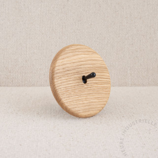 Interrupteur simple Modelec Iris chêne clair levier noir