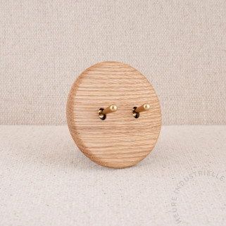 Interrupteur double Modelec Iris chêne clair levier laiton