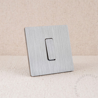 Interrupteur simple Modelec M nickel brossé touche blanche